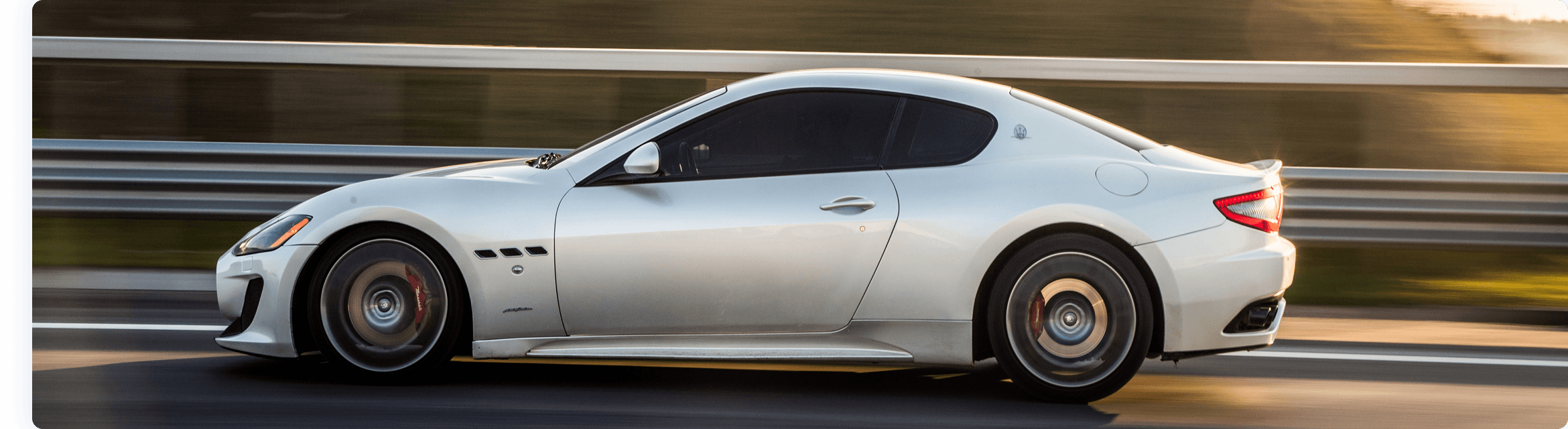 White Coupe Sports Car on Highway